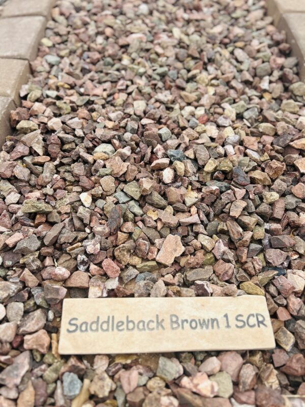 Close visual of Saddleback Brown 1" screened landscape rock